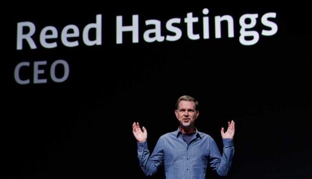 netflix-ceo-reed-hastings-arms-in-the-air