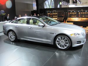 The swoopy coupe-like profile of the XJ defies the traditional three-box design of most sedans.