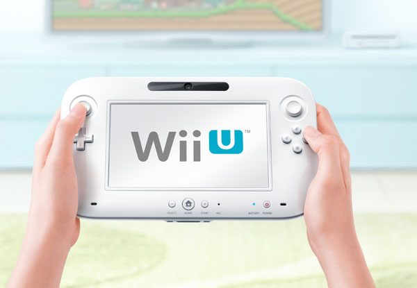 Nintendo Wii U controller, console in background