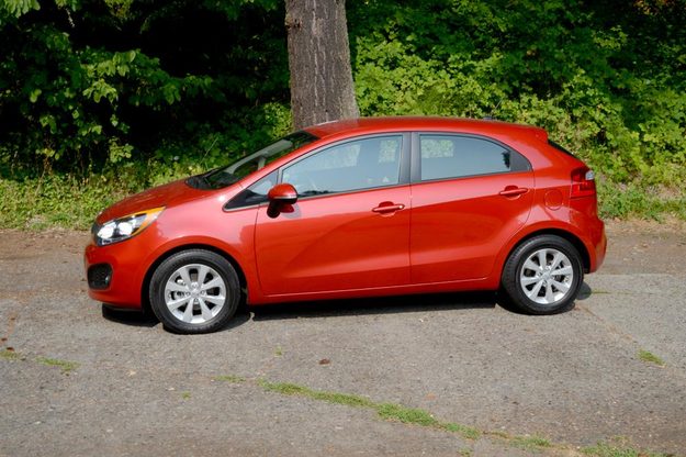 kia rio review side on 2012 compact