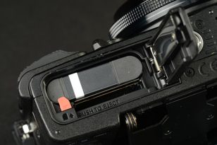 Olympus Stylus XZ 2 iHS Review digital camera battery compartment