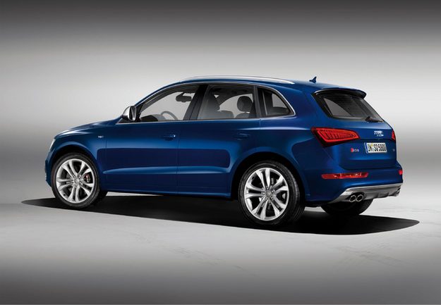 Audi SQ5 gray background rear three quarter view