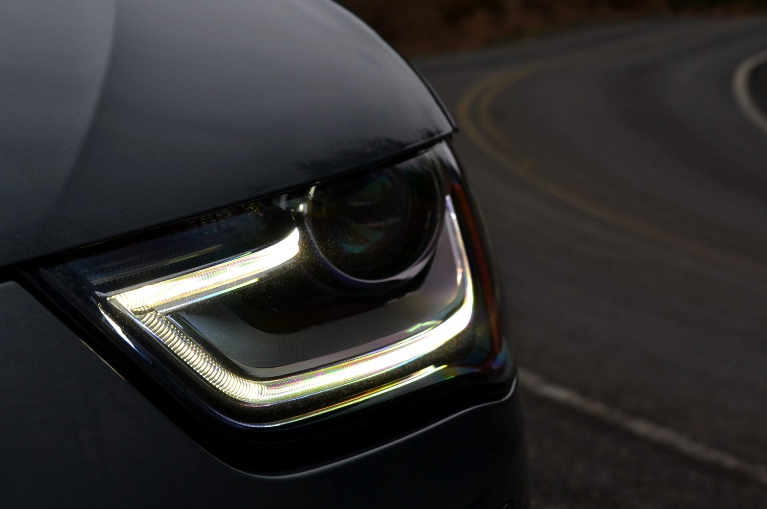 review audi 2013 allroad needs someroad to thrive but wins style points at the mountain headlight