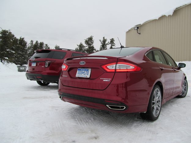 2013 Ford Fusion and Explorer rear three quarter