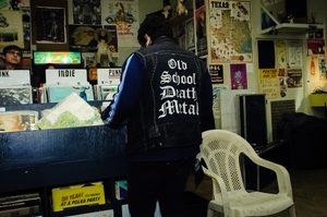 Man browsing vinyl records