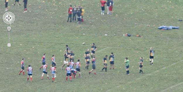 A rugby game in Regent's Park shown in great detail from the BT Tower.