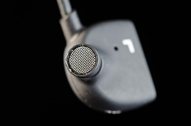T Jays 4 in ear headphones left earbud macro