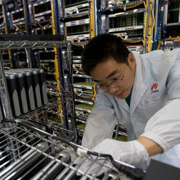 Huawei R&D staff performing routine maintenance