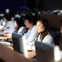 Huawei call center engineers at the command center in Shenzhen