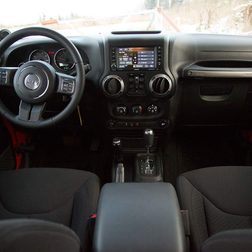 2014 Jeep Wrangler Unlimited Sport interior front rear view