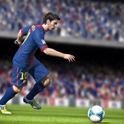 A soccer player approaching the ball.