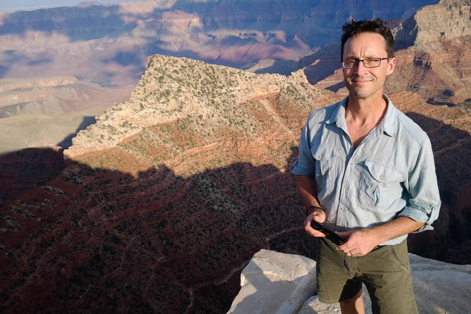 National Geographic photographer Stephen Alvarez, on assignment and standing on top of the world (of sorts).