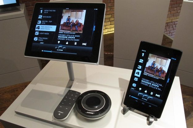 Bose SoundTouch controller options, including (left to right) iOS on iPad, standard remote control, SoundTouch Controller, and Android on Nexus