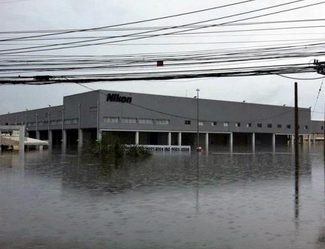Besides consumers' preference for smartphone photography, camera companies have had to deal with issues like natural disasters. (Image via Steve's Digicams)