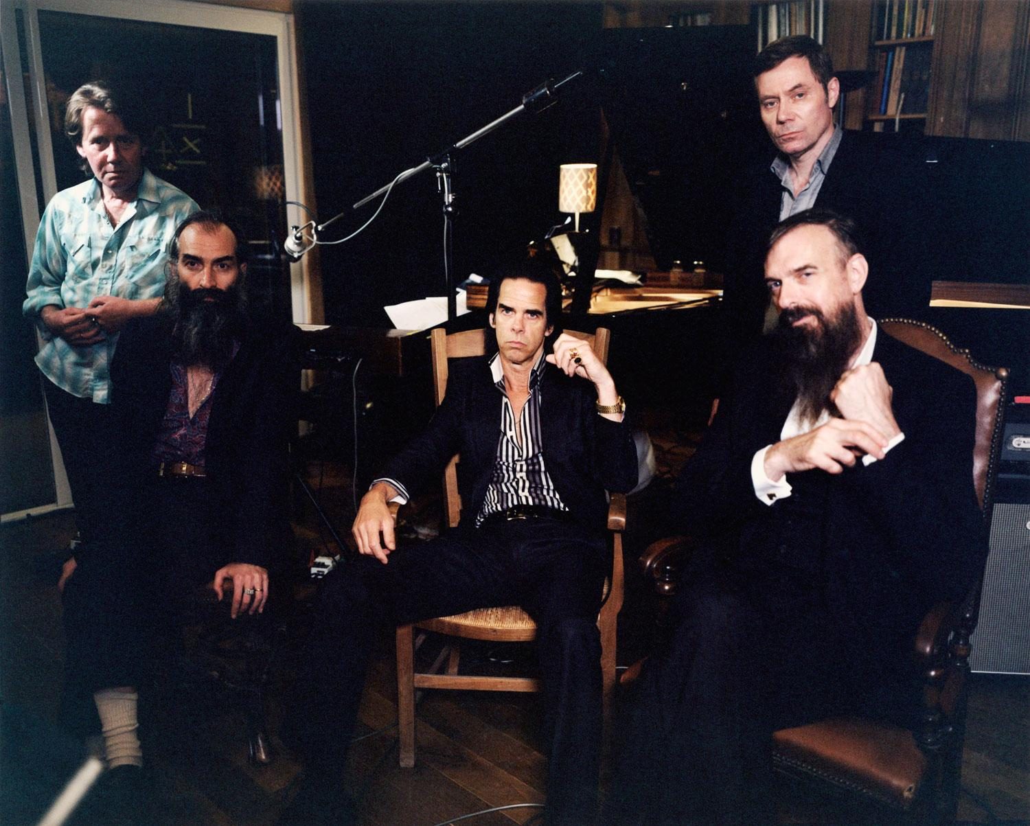 Nick Cave poses with his band.