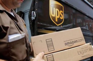 UPS driver delivering packages