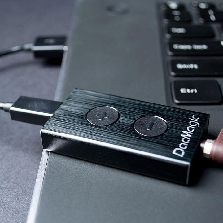 DacMagic DAC with connected headphones.