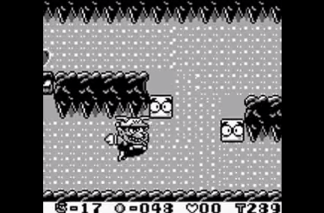 Wario swims in Wario Land: Super Mario Land 3.