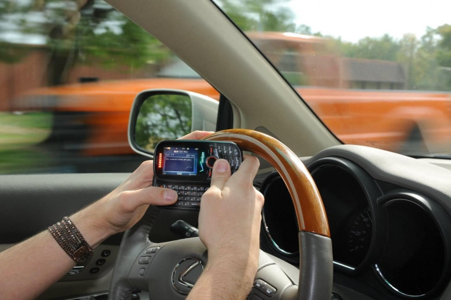 texting while driving in a Lexus