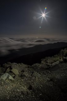 Painting with light effect on a pre-eclipse moon.
