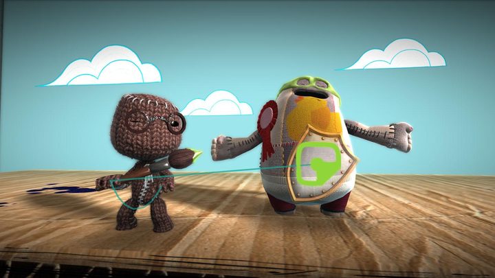 A sackboy with glasses pulling on green thread with another guy standing next to him.