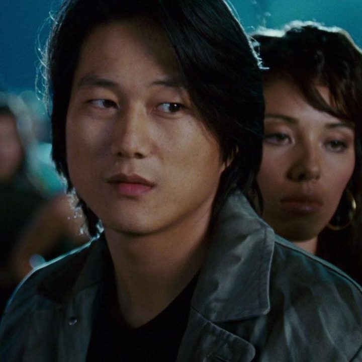 Han stares with a side eye in Tokyo Drift.