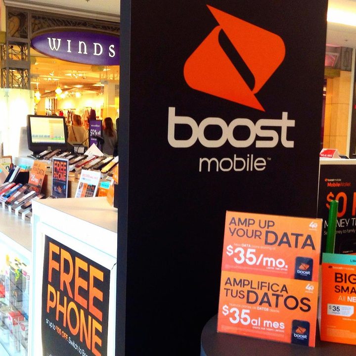 A Boost Mobile advertising display in a mall kiosk.
