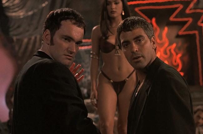 Quentin Tarantino, George Clooney, and Salma Hayek stand at a bar in From Dusk Till Dawn