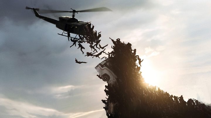 Zombies try to grab on to a helicopter in World War Z.