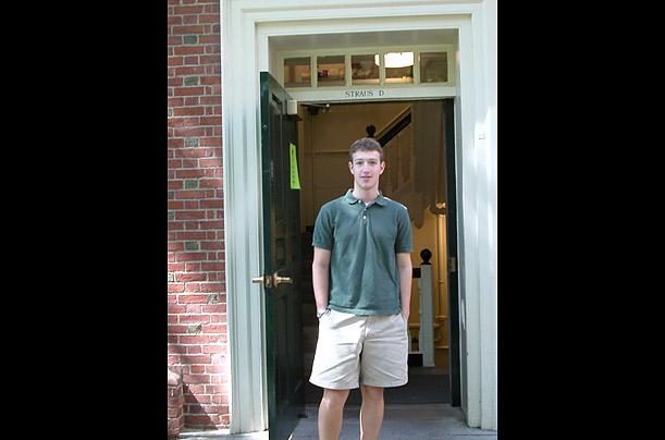 Mark standing outside his freshman dorm