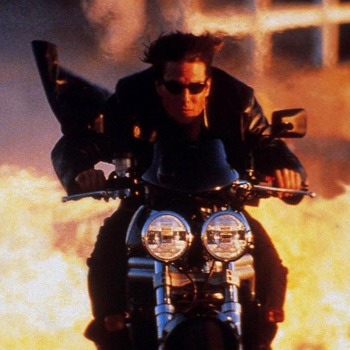 Tom Cruise riding a motorcycle in "Mission: Impossible 2."