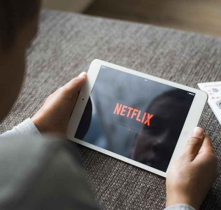 The Netflix logo on a tablet screen.