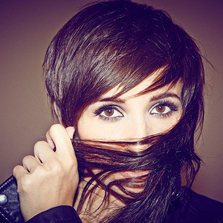 lights on little machines recording through her pregnancy hair over face