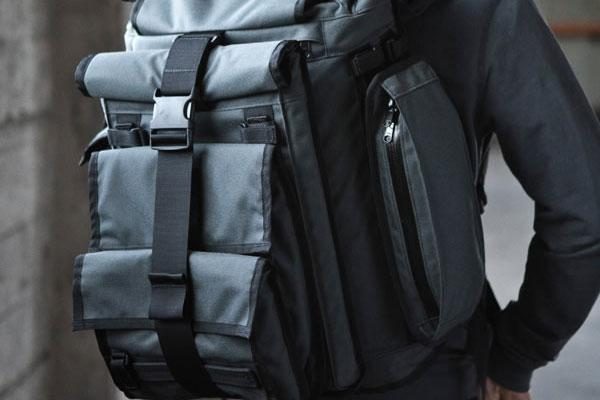 Close up rear profile view of a person wearing a Mission Workshop&nbsp;R6 Arkiv Field Pack.