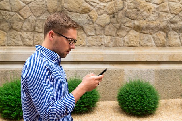Looking_At_Phone_shutterstock_281039135