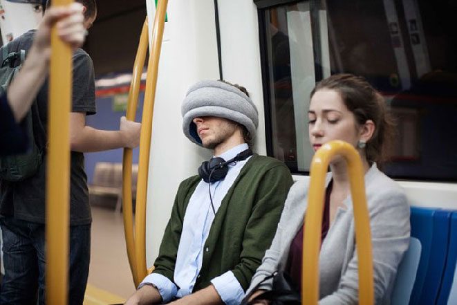 best gear for sleeping on plane trains and buses studio banana things ostrich pillow light travel  21
