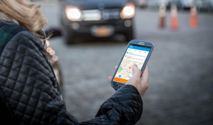 Booking a ride through the Via app.