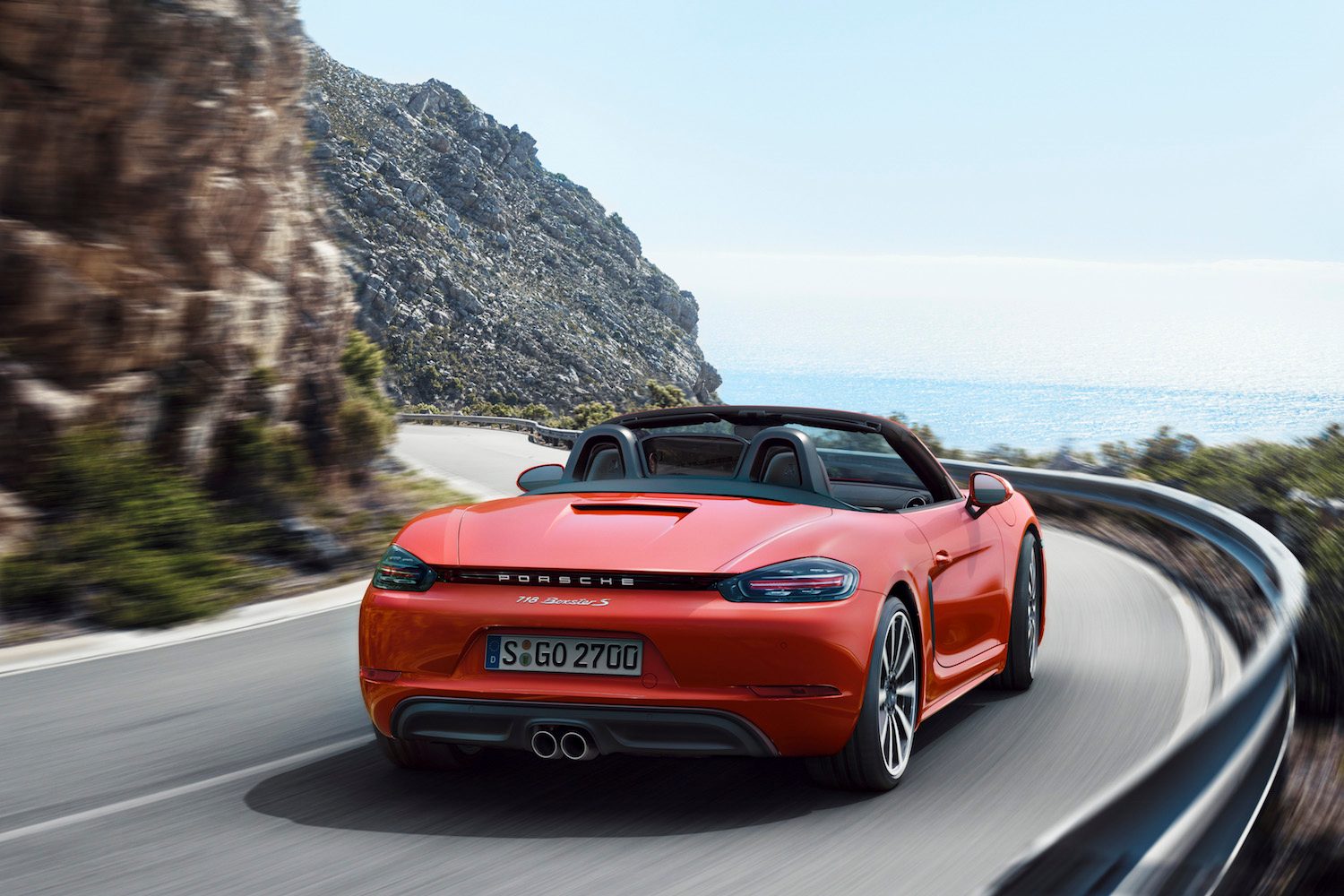 Porsche 718 Boxster orange rear