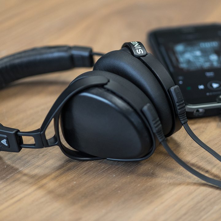 Audeze Sine headphones connected to MP3 player.