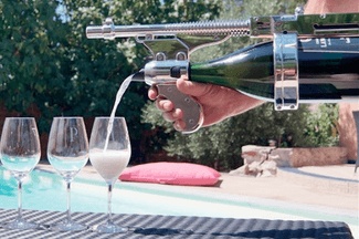 This champagne gun is a real thing, for when putting your thumb on the bottle isn't enough