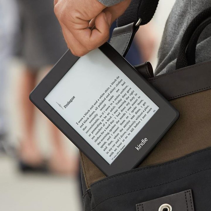 amazon kindle held in hand
