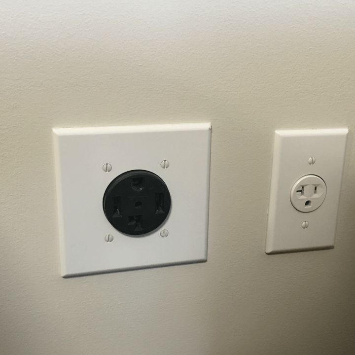 An electric and gas dryer outlet, on the left and right, respectively.