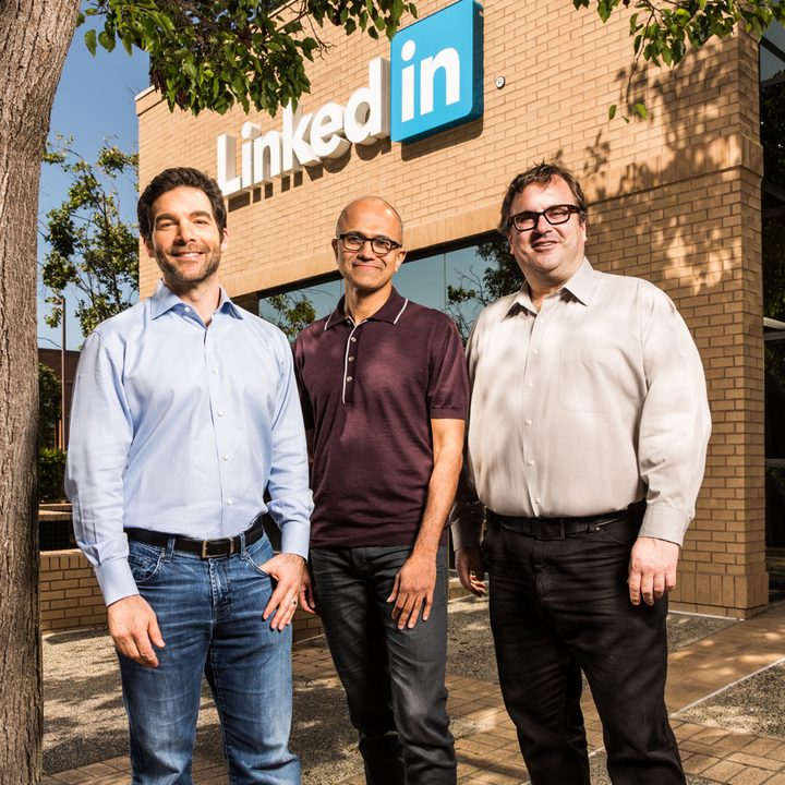 Executives standing in front of the Linkedin offices.