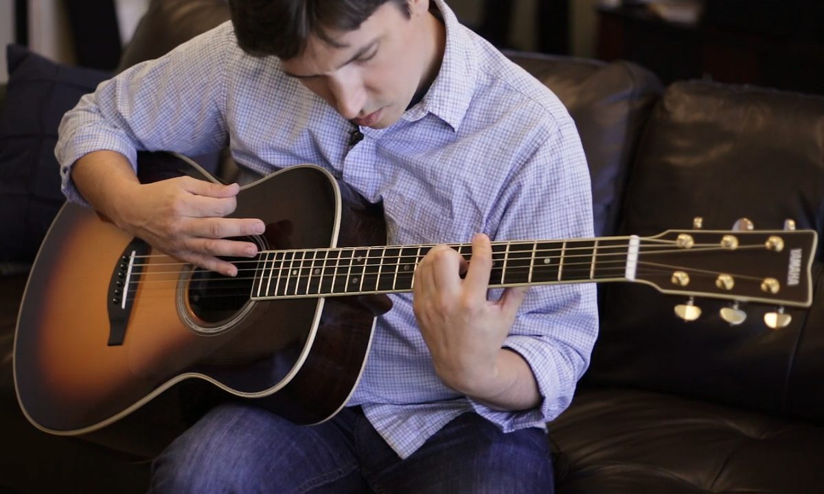 Man playing the guitar