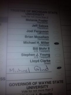 This photo showing a vote for Michigan State University trustees has resulted in a lawsuit questioning the ban on ballot photography