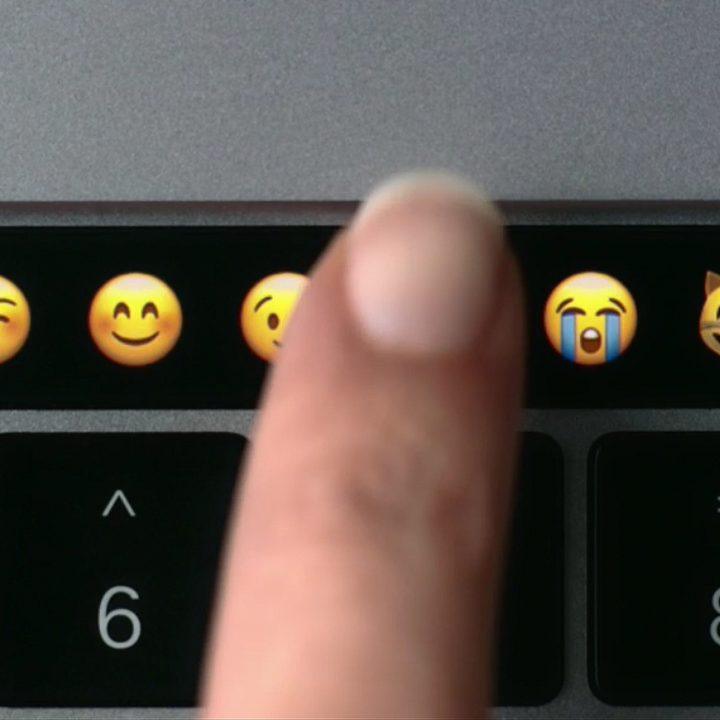 The TouchBar displaying emojis.