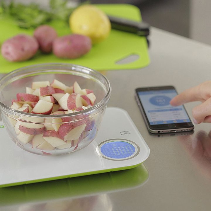Food being measured with a kitchen scale.