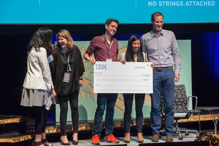 Poda Foods founders Yesenia Gallardo and and Kenny Cloft (center) accept a PitchfestNW grand prize from Portland Development Commission's Jared Wiener (right)