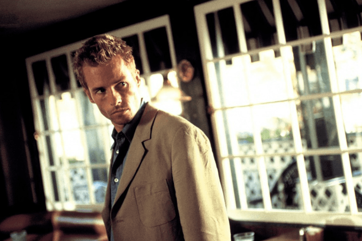 A man looks back in Memento.