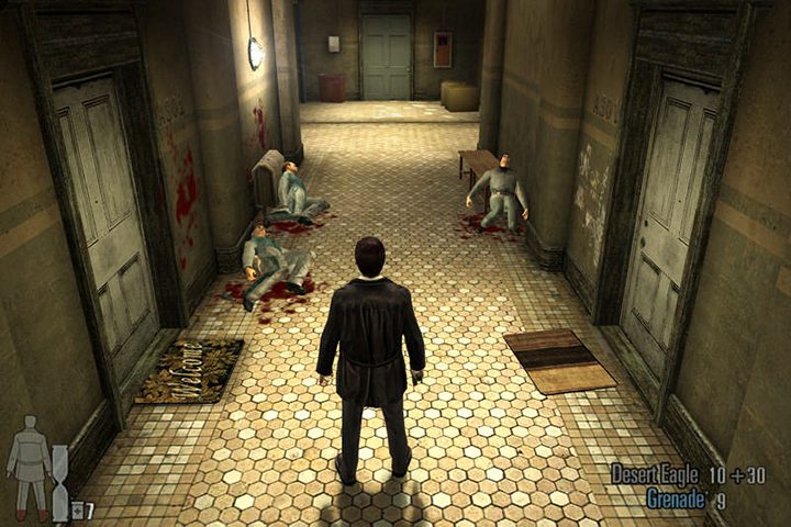 Max Payne looks at a bloody hallway in Max Payne 2.